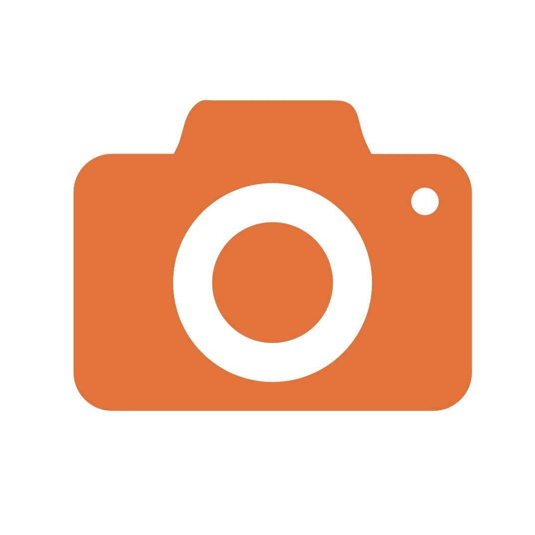 A flat orange camera icon with a white lens circle and small flash dot on a plain white background.