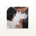 A square 3x3 mosaic tile wall art print featuring a close-up family photograph of a couple and baby, displayed on a light beige background.